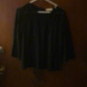 Michael Kora black top is slight see thru